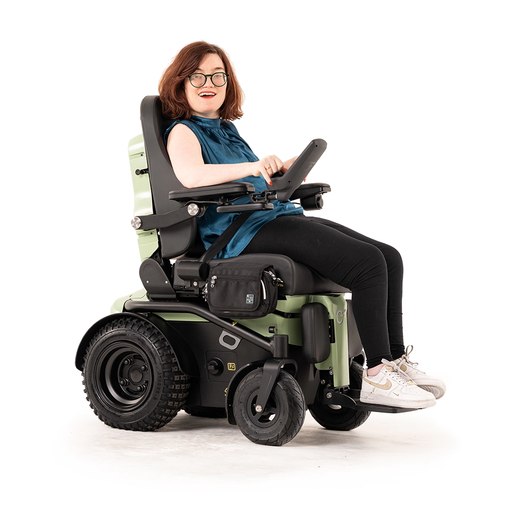 pricing-image-woman-sitting-in-powerchair-smiling-01